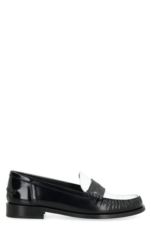 Giày lười nữ da bò màu đen với da bò lộn bbrush, đầu tròn và chi tiết cột dây FW23