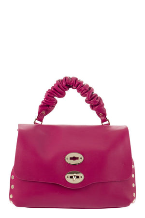 粉色經典手提包 - 時尚女性的萬用風格