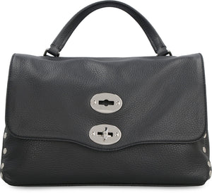 經典紋理皮革手提包，配有華麗裝飾釘，適合女性使用，顏色：黑色