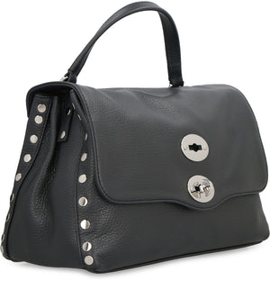經典紋理皮革手提包，配有華麗裝飾釘，適合女性使用，顏色：黑色