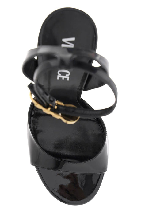 VERSACE Sleek and Edgy Patent Leather Sandals for the Fashion-forward Woman