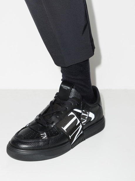 VALENTINO GARAVANI Contemporary Black Leather Sneakers with Logo Accent