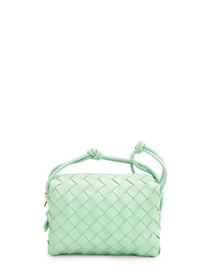 Túi đeo vai nhỏ da xanh lá cây với dây đeo nơ trang trí