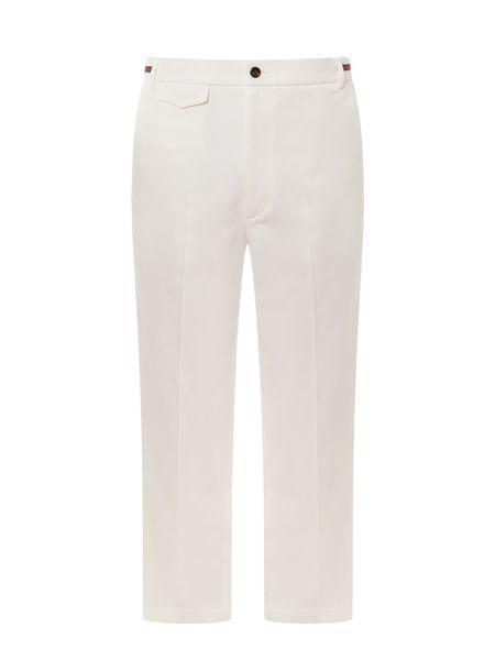 白色纯棉工装裤配上网格和GG绣花细节