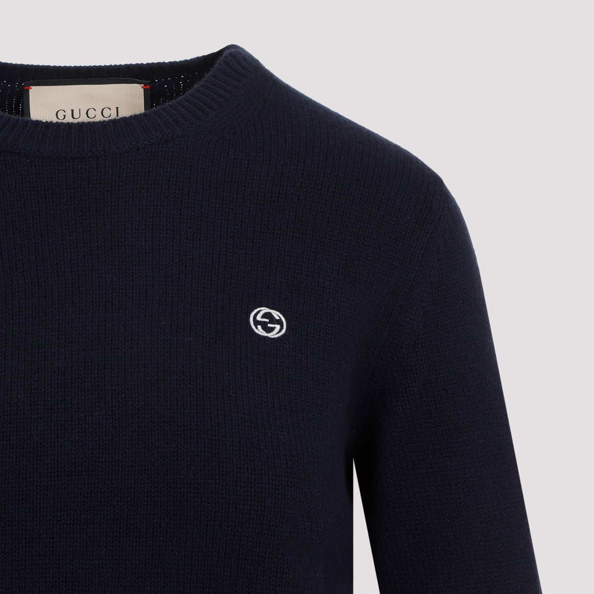 Áo len dệt nổi màu xanh đậm từ chất liệu cashmere và len mùa SS24