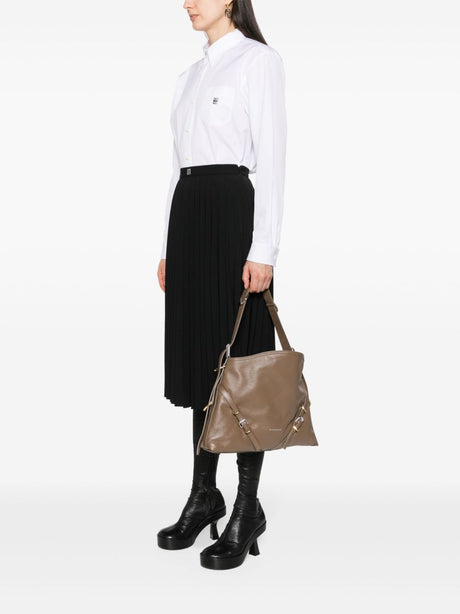 时髦的浅褐色女式斜挎手提包