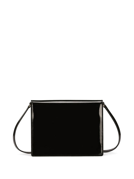 シンプルな黒の光沢が高級感とスタイルを表現する、女性向けパテントレザーのクロスボディハンドバッグ