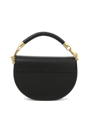 黑色鏈條袋 - 兼具俐落和時尚的肩背交叉包