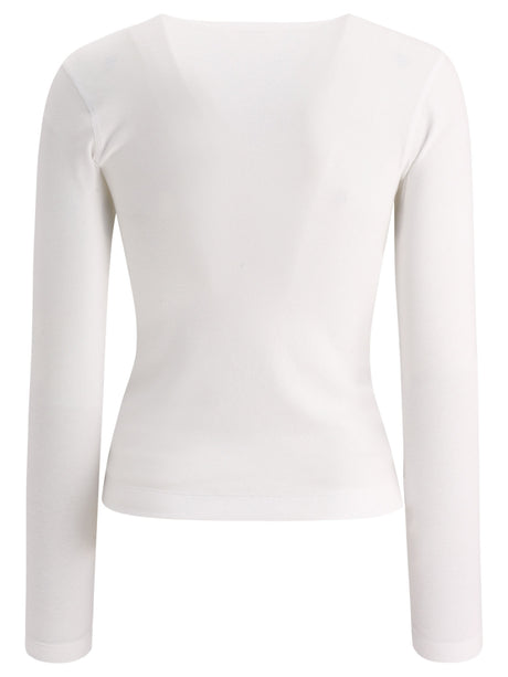 上品な白色VネックTシャツ。ニッケルフリーモニリ装飾とレギュラーフィットデザインで女性にもぴったり