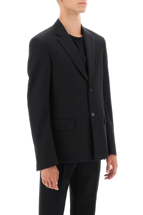 男士黑色单排扣羊毛外套，带翻领和前袋