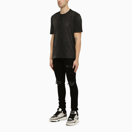 AMIRI Men's Black Skinny Jeans with Camouflage Patches for SS24